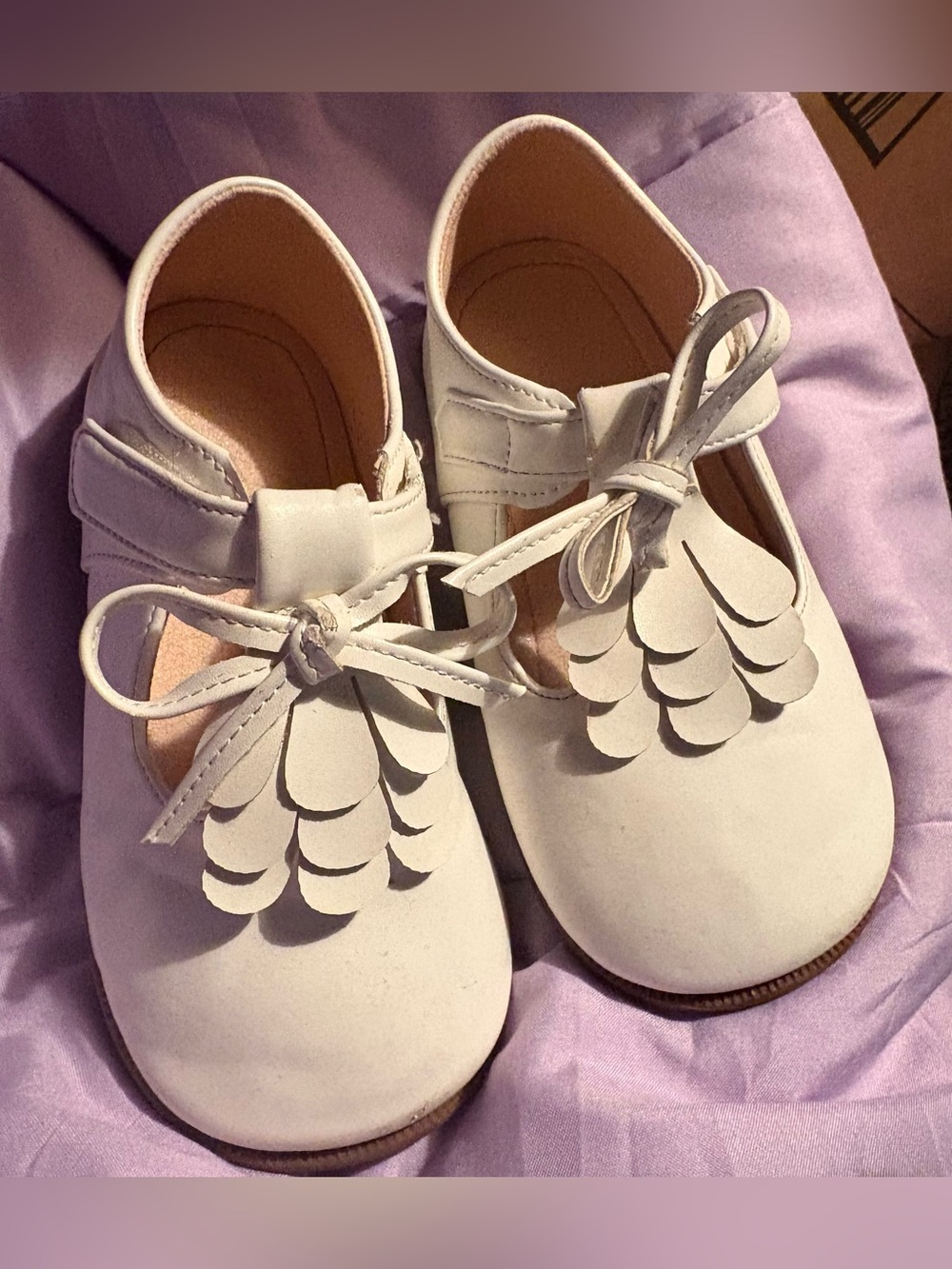 Unsure of brand girls size 28 or 11c white shoes